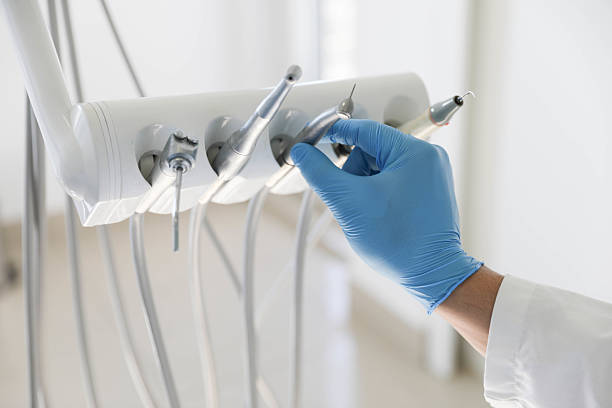 Professional Root Canal Treatment technician working in Gibraltar, MI